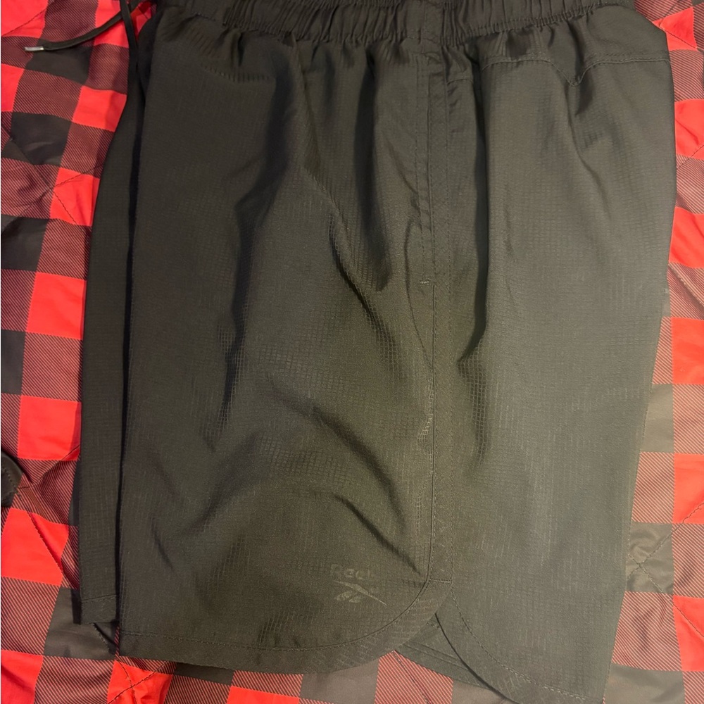 Reebok Men's black athletic/soccer shorts, size medium, good condition